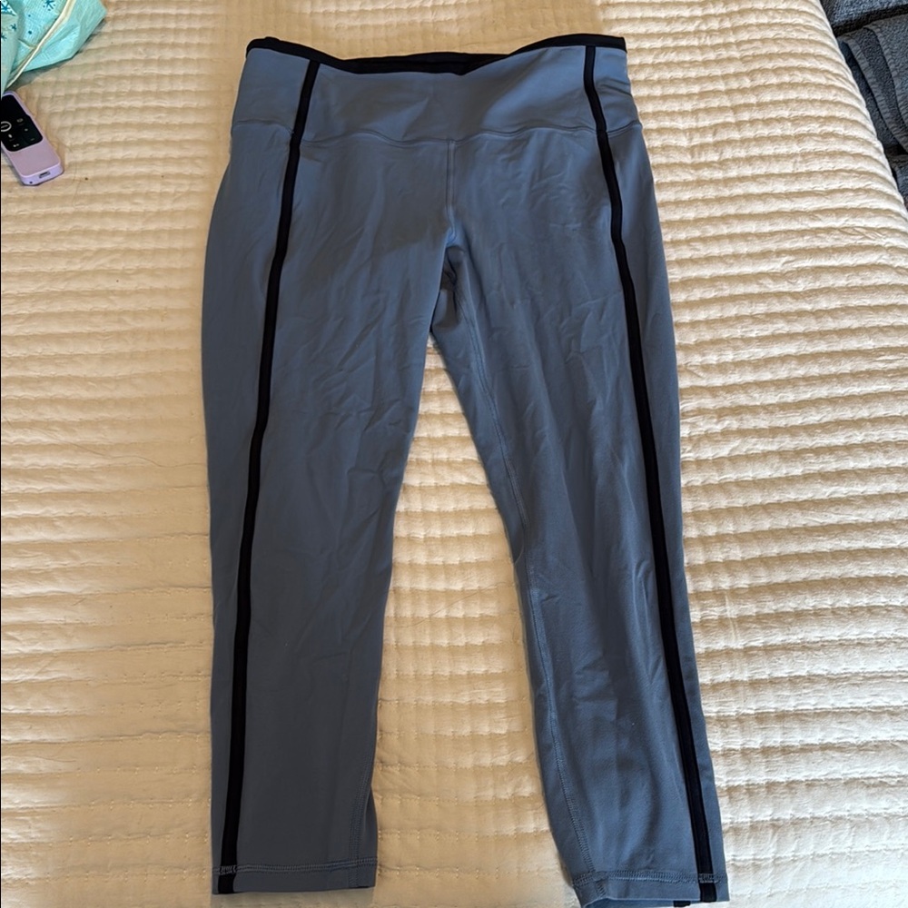 Blue athleta leggings with navy blue trim